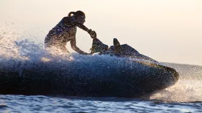 Solutions based on Bosch large-volume production technology for powersports vehicles, including offroad, snowmobiles, road, and jet skis as shown in the photo